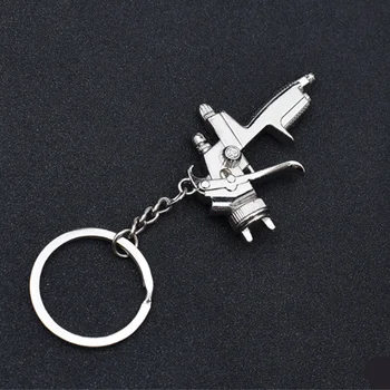 1pc Kūrybos Keychain Automobilio Dažų Teptukas Purškimo paketų prižiūrėtojų raktinę Purkštuvo Kuro Pistoletas Modelis Key Chain Lydinio Šalis dovana Pakabukas QLY9135