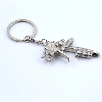 1pc Kūrybos Keychain Automobilio Dažų Teptukas Purškimo paketų prižiūrėtojų raktinę Purkštuvo Kuro Pistoletas Modelis Key Chain Lydinio Šalis dovana Pakabukas QLY9135